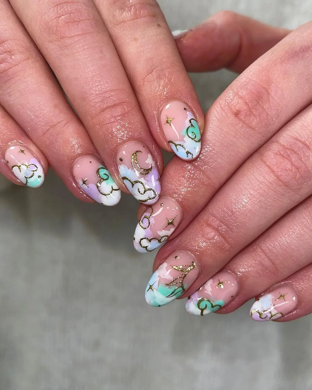 Charming pastel cloud nail art design