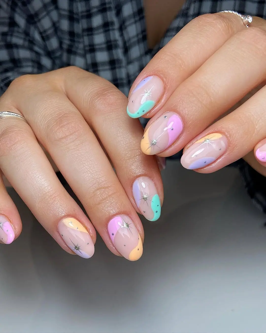 Colorful pastel nails with playful star details