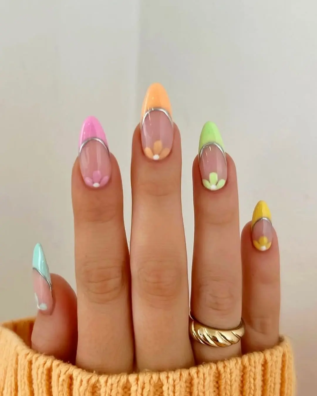 Vibrant Pastel Nails with Floral Touch