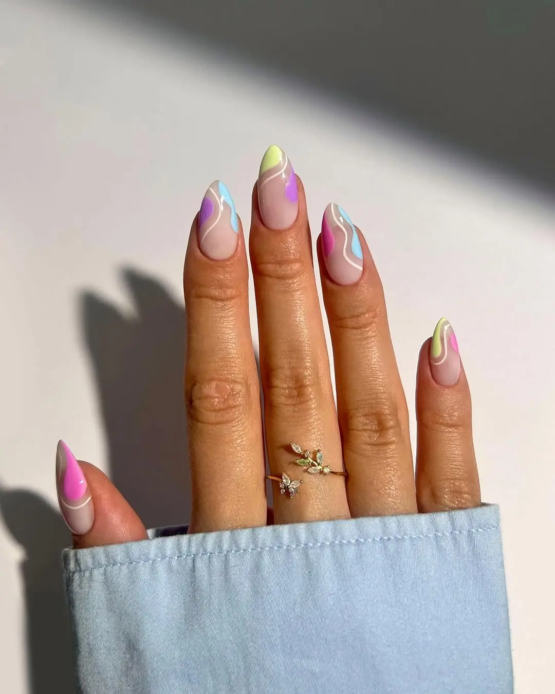 Vibrant pastel swirls for spring nails