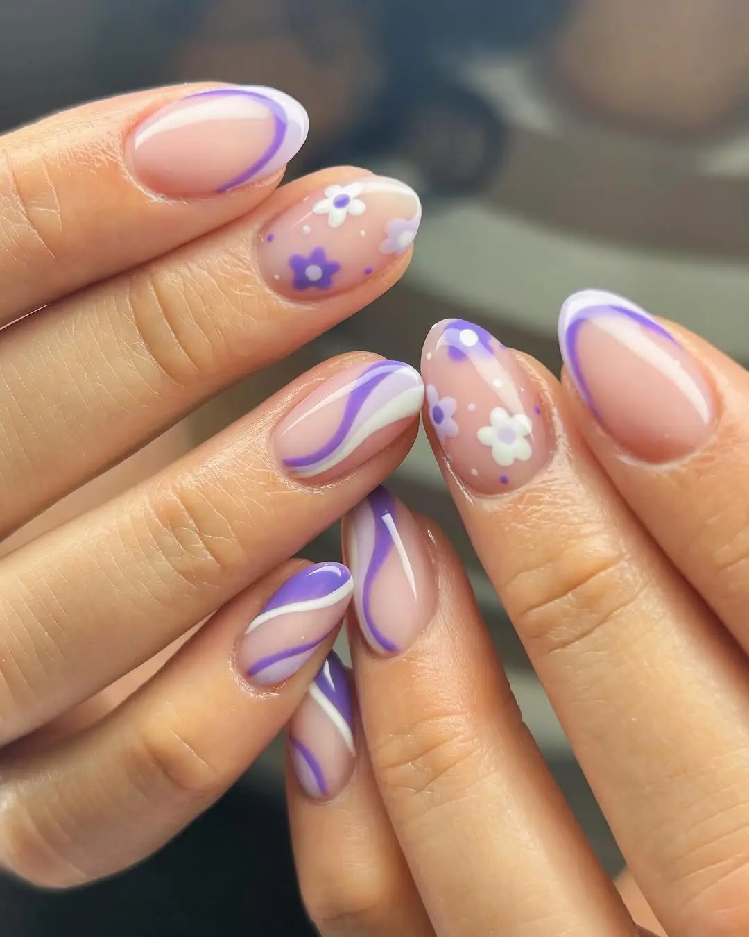 Charming pastel nails with floral accents