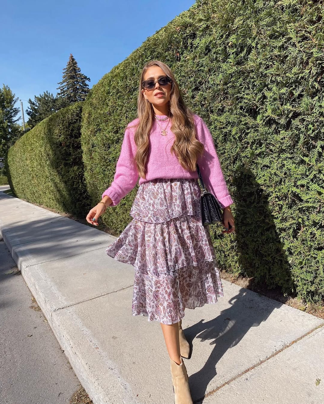 Chic Spring Style: Sweater Meets Floral Skirt