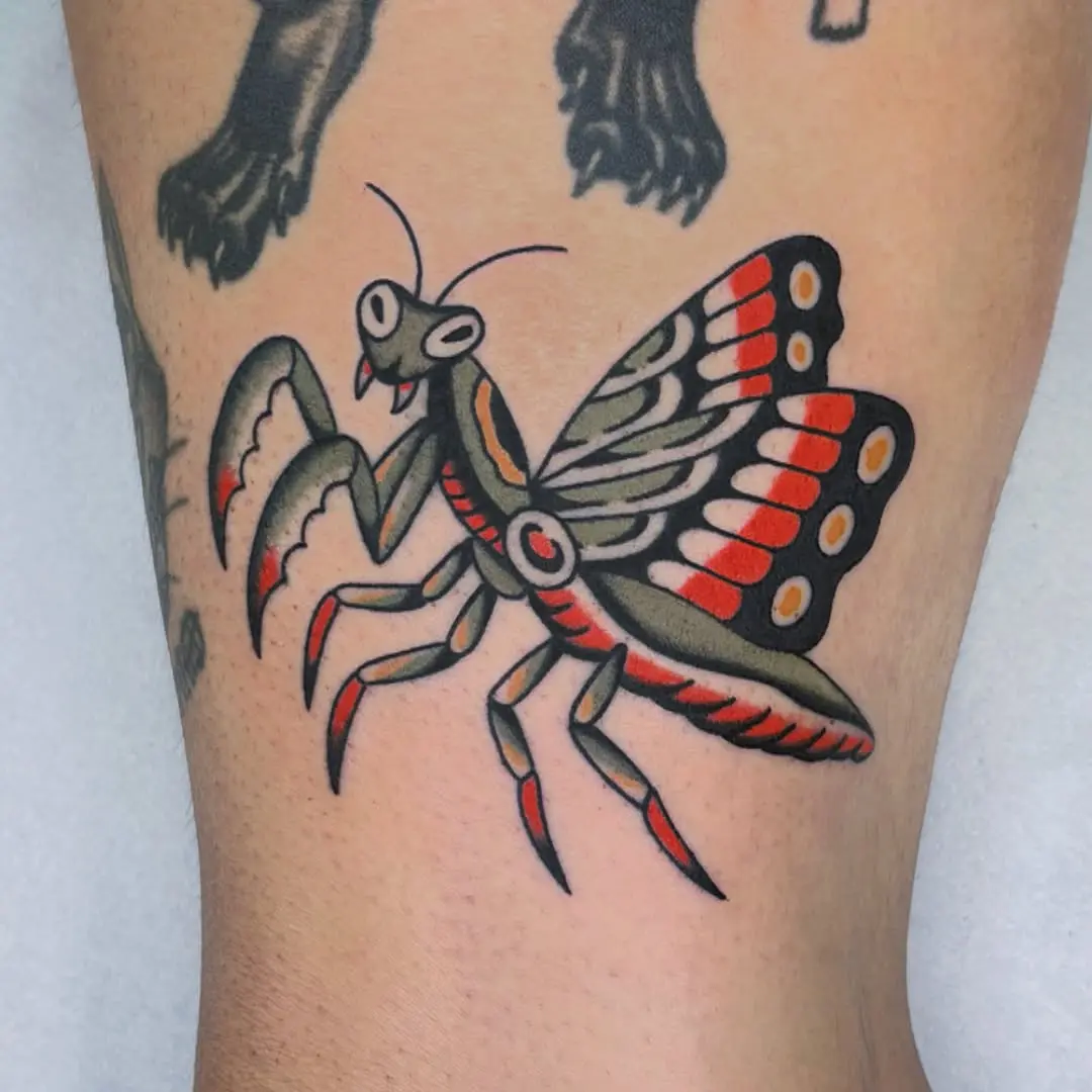 Vibrant praying mantis tattoo with striking details