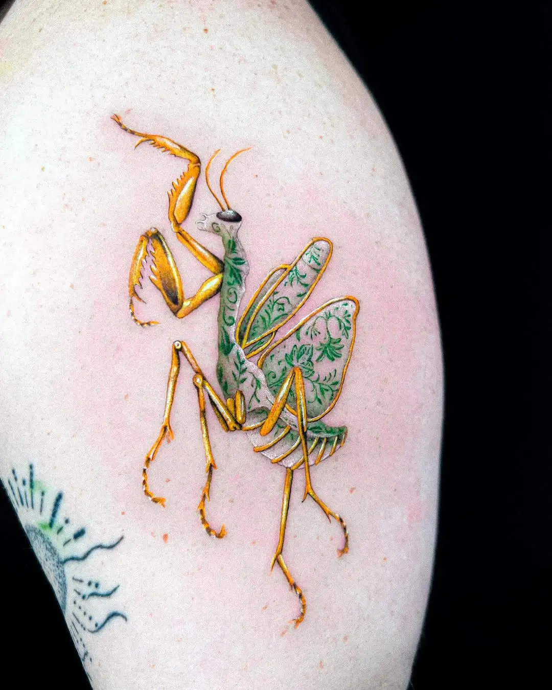 Colorful Praying Mantis Tattoo with Floral Elements
