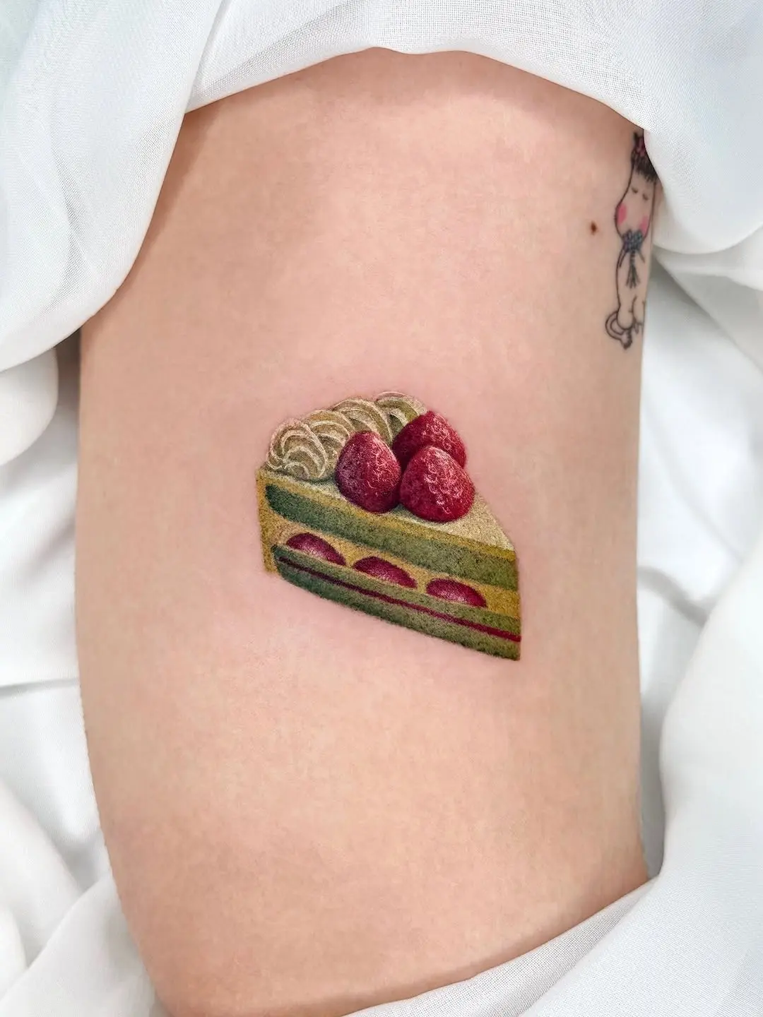 Deliciously Detailed Cake Tattoo Design