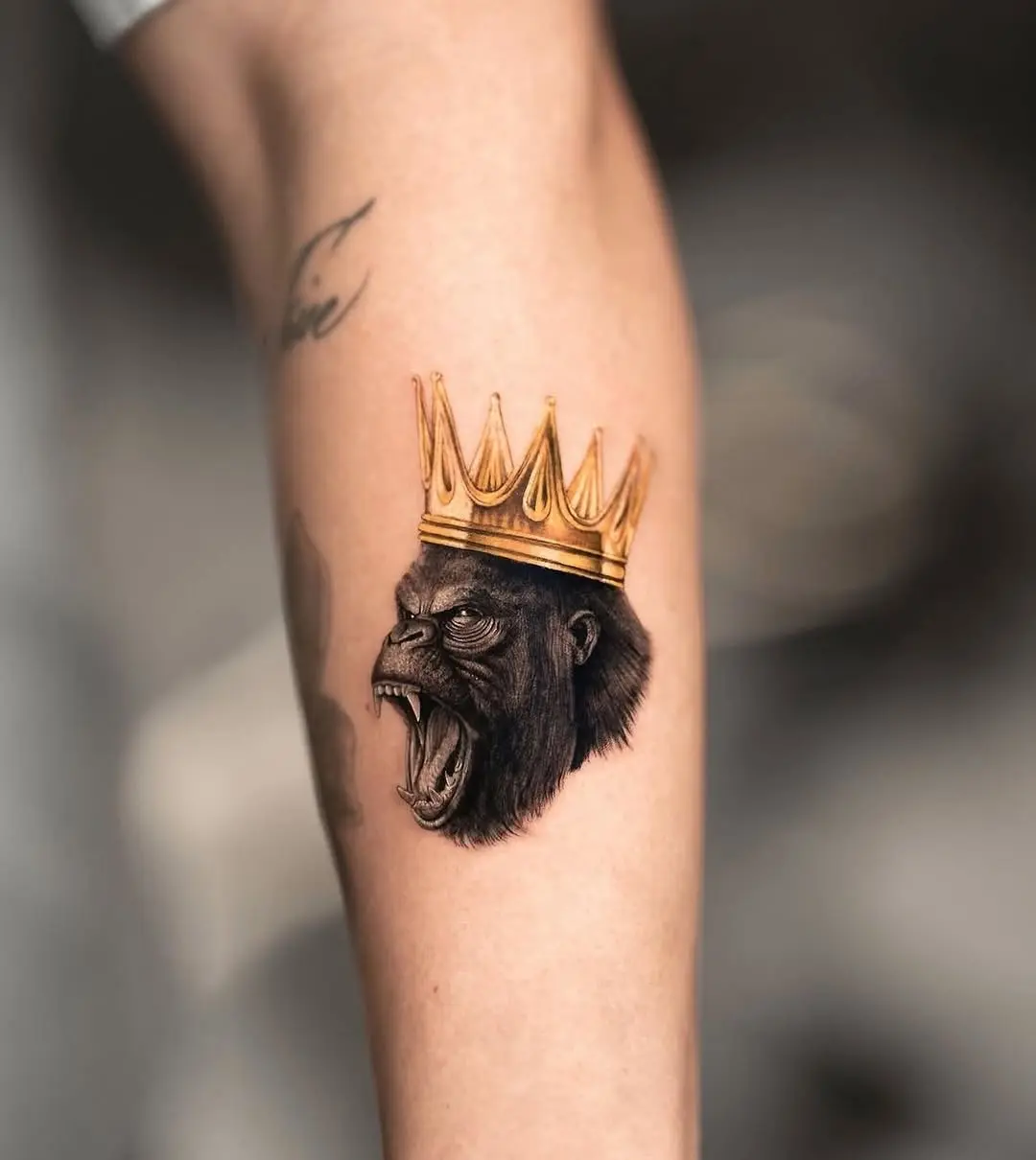 Majestic Gorilla Tattoo with a Royal Crown