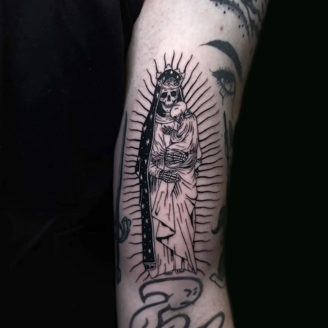 Intricate Santa Muerte tattoo depicting life and death