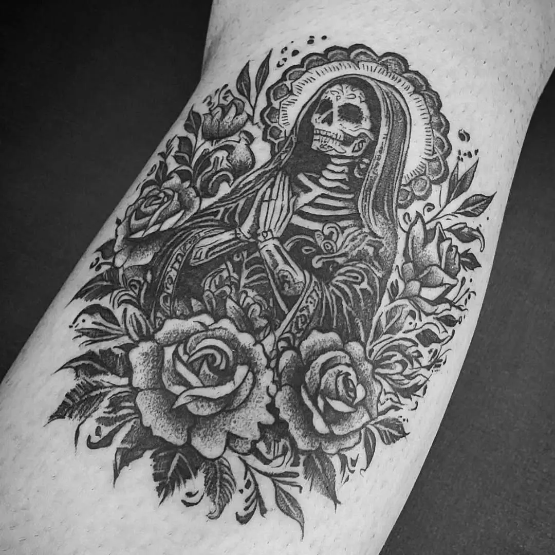 Elegant Santa Muerte Tattoo Surrounded by Roses