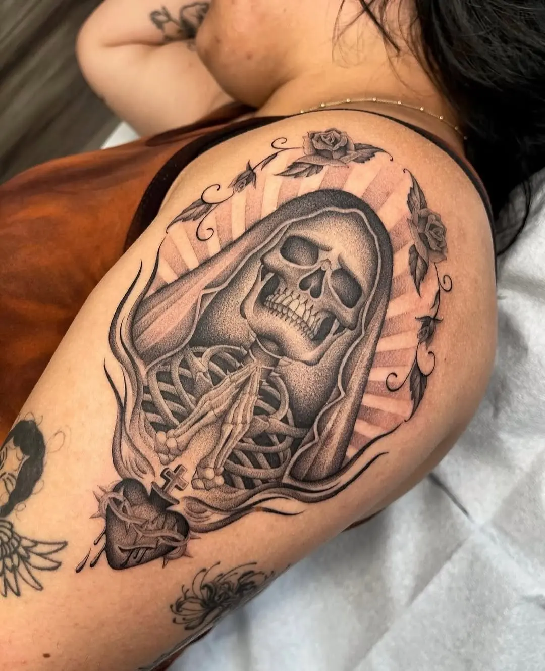 Intricate Santa Muerte Tattoo with Roses