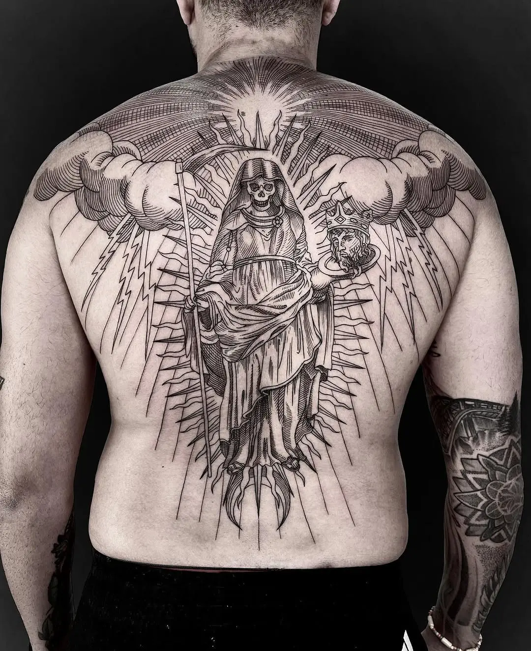 Stunning Santa Muerte Tattoo with Radiant Details