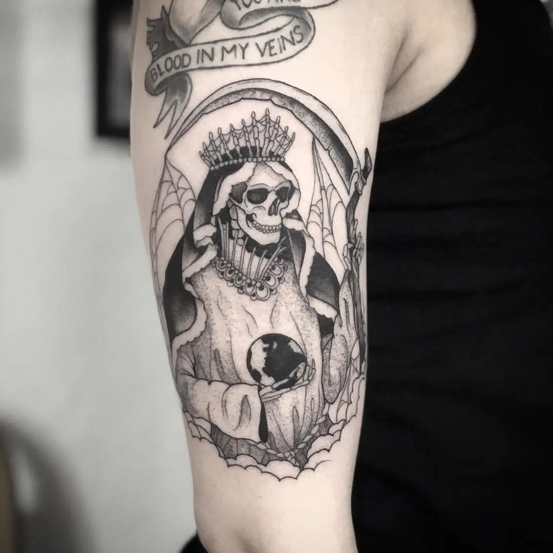 Intricate Santa Muerte tattoo with powerful symbolism
