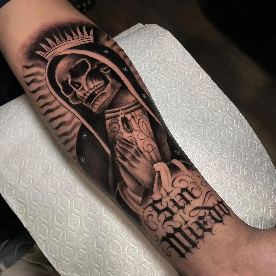 Intricate Santa Muerte tattoo showcasing detailed artistry.