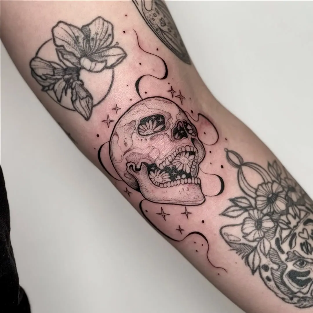 Intricate skull adorned with floral elements