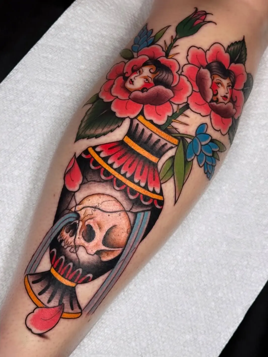 Bold floral skull tattoo with vintage vibes