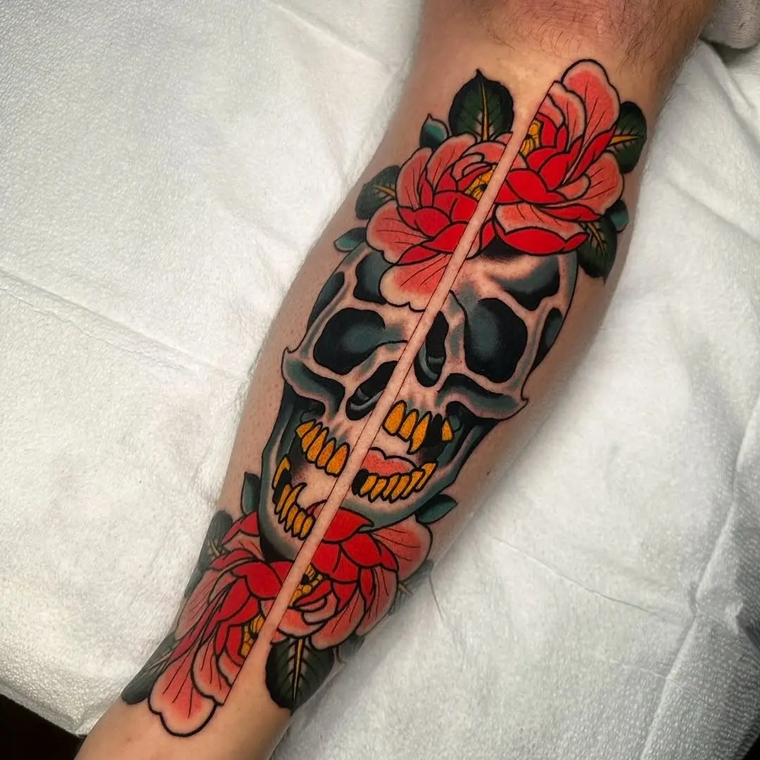 Bold Skull Tattoo with Floral Accents