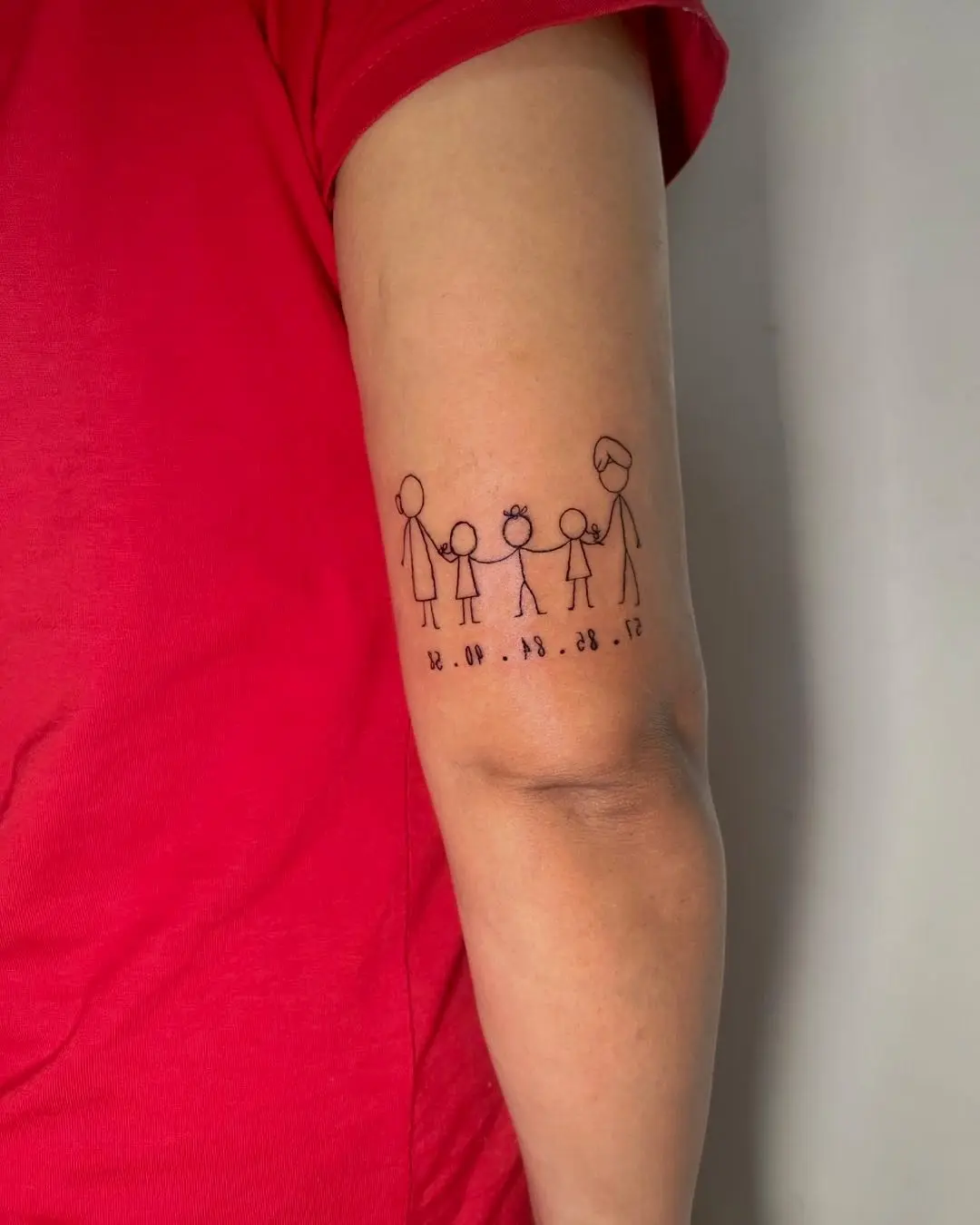 Heartfelt stick figure family tattoo concept