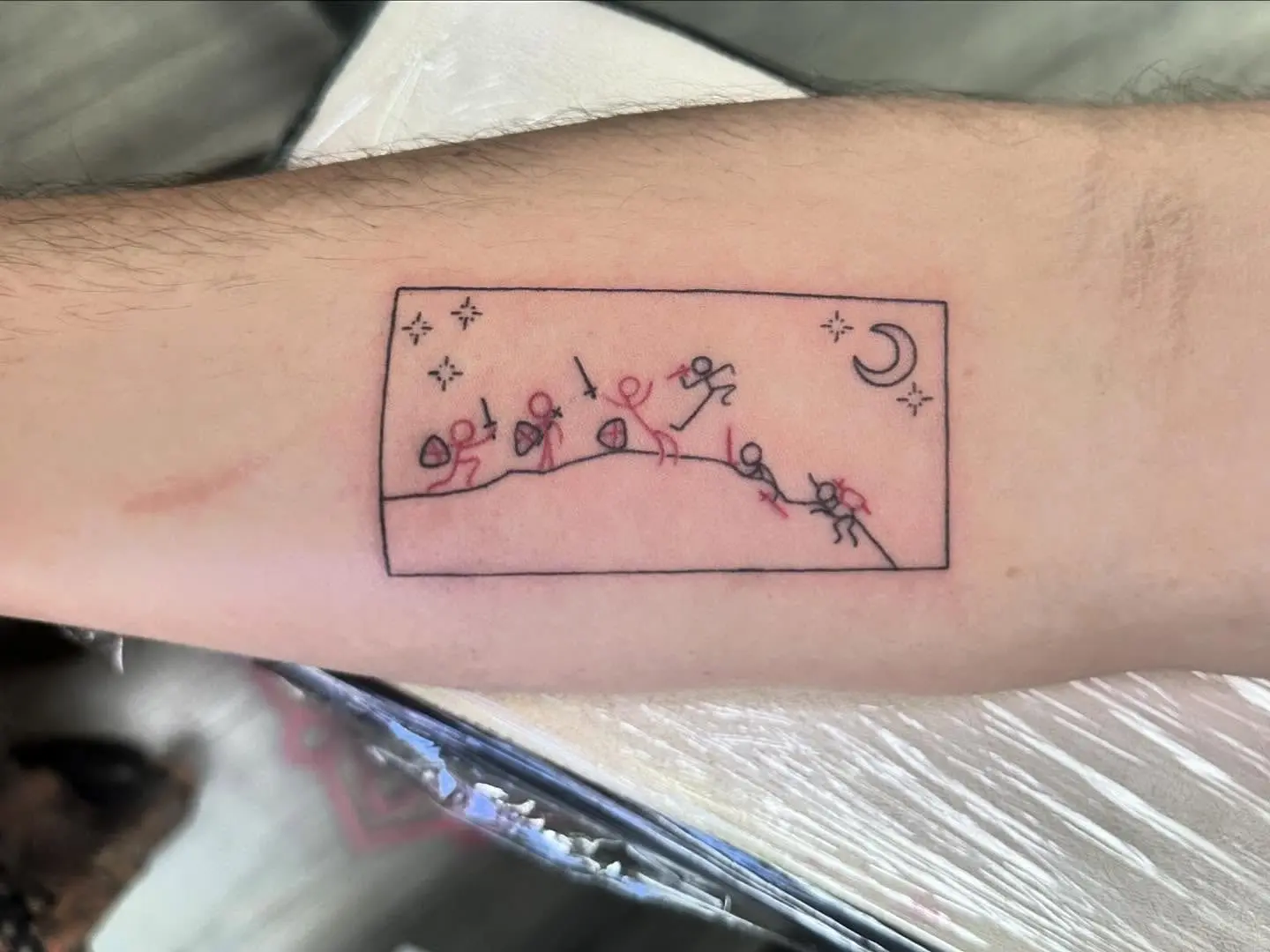 Unique stick figure night scene tattoo design