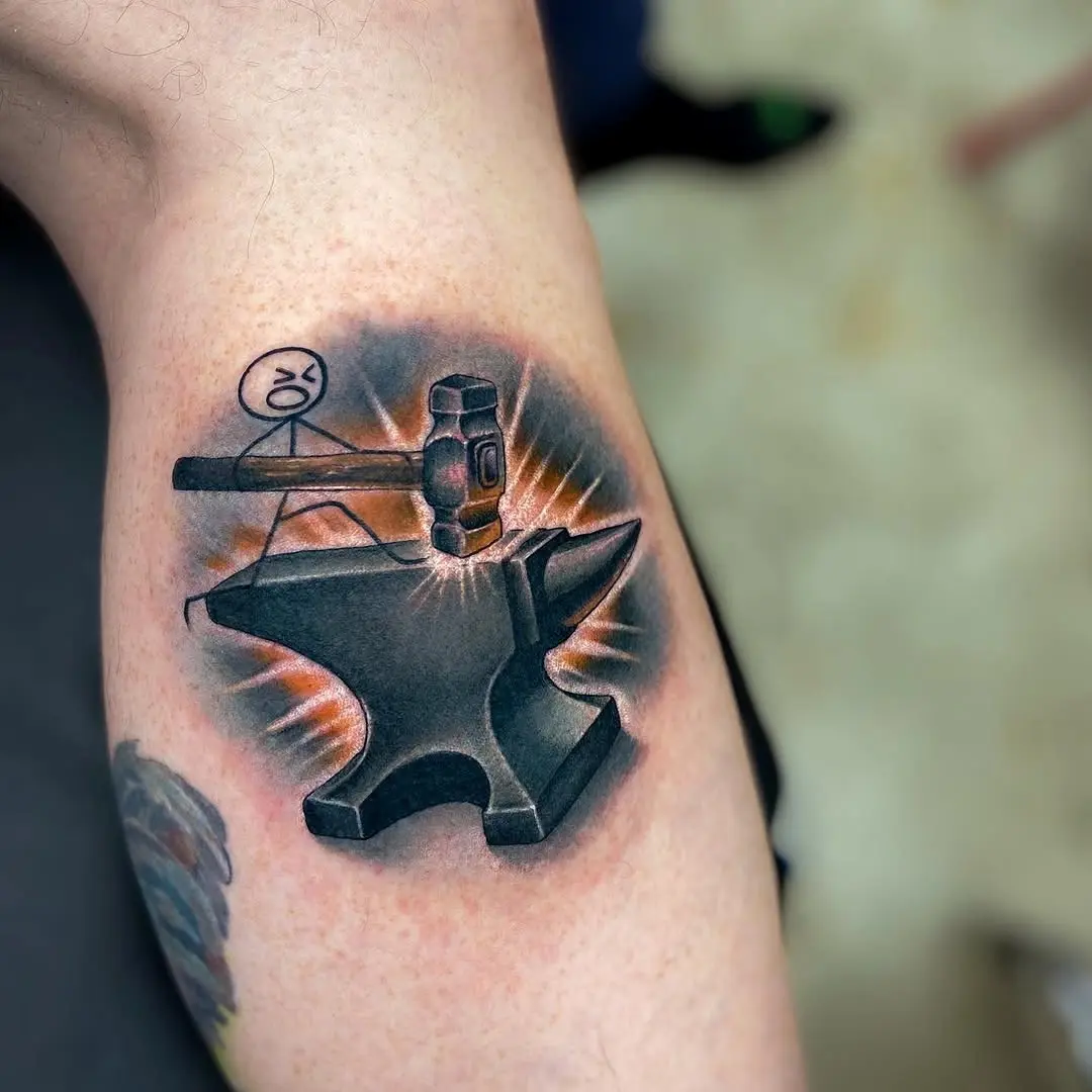 Creative stick figure with hammer and anvil tattoo