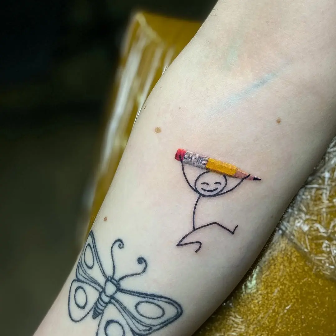Cheerful stick figure with a pencil tattoo