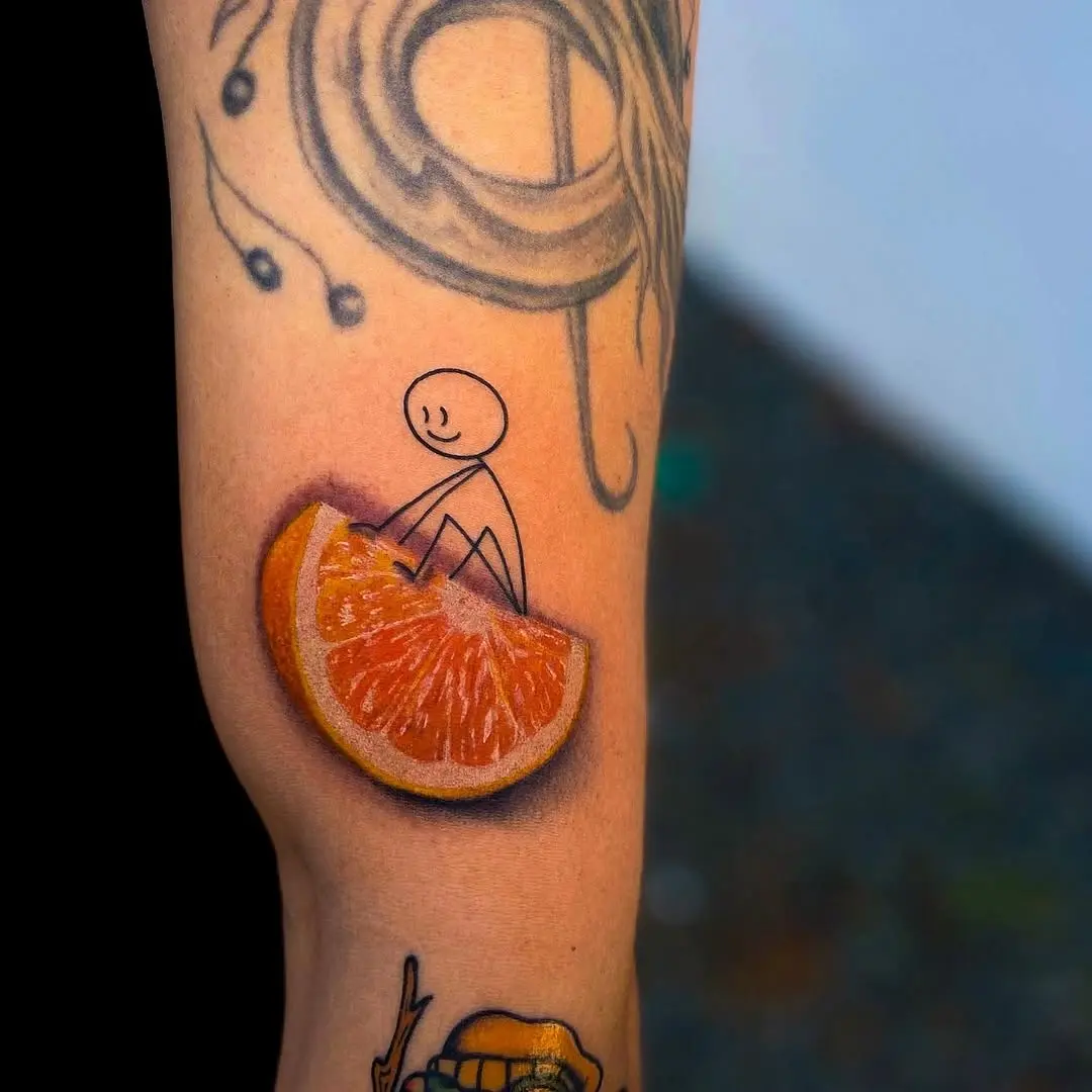Playful Stick Figure on Juicy Orange