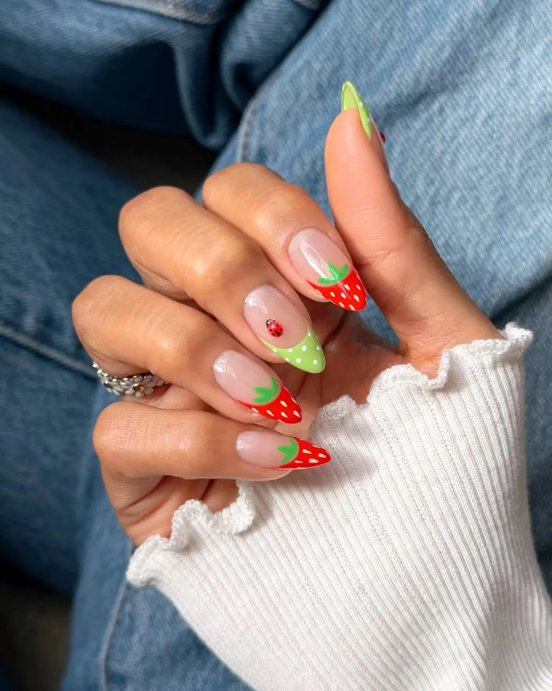 Vibrant strawberry nail art for summer vibes