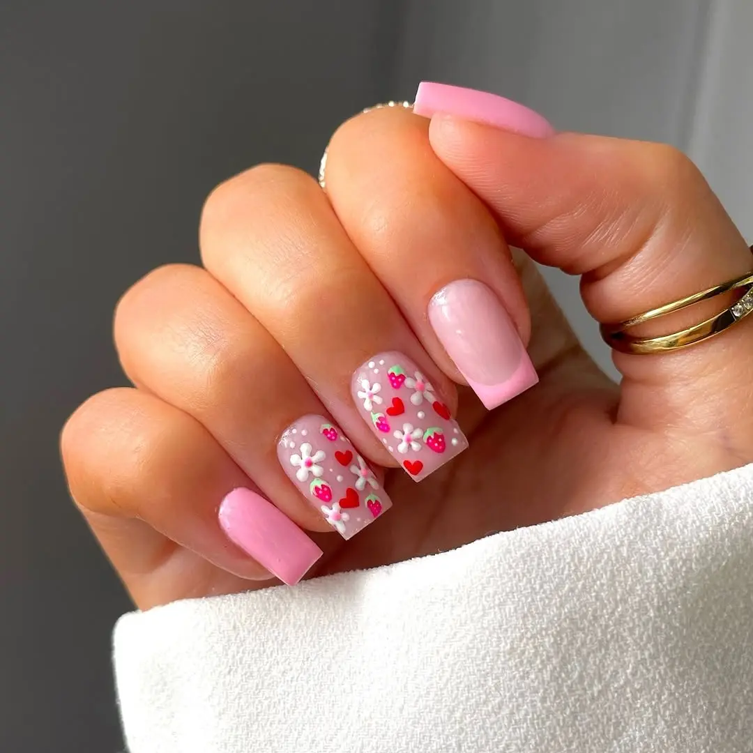 Charming strawberry and floral nail design details