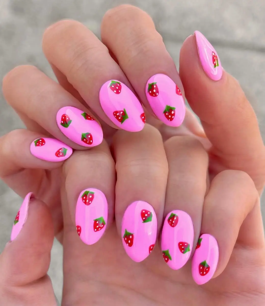 Vibrant strawberry nails with playful design