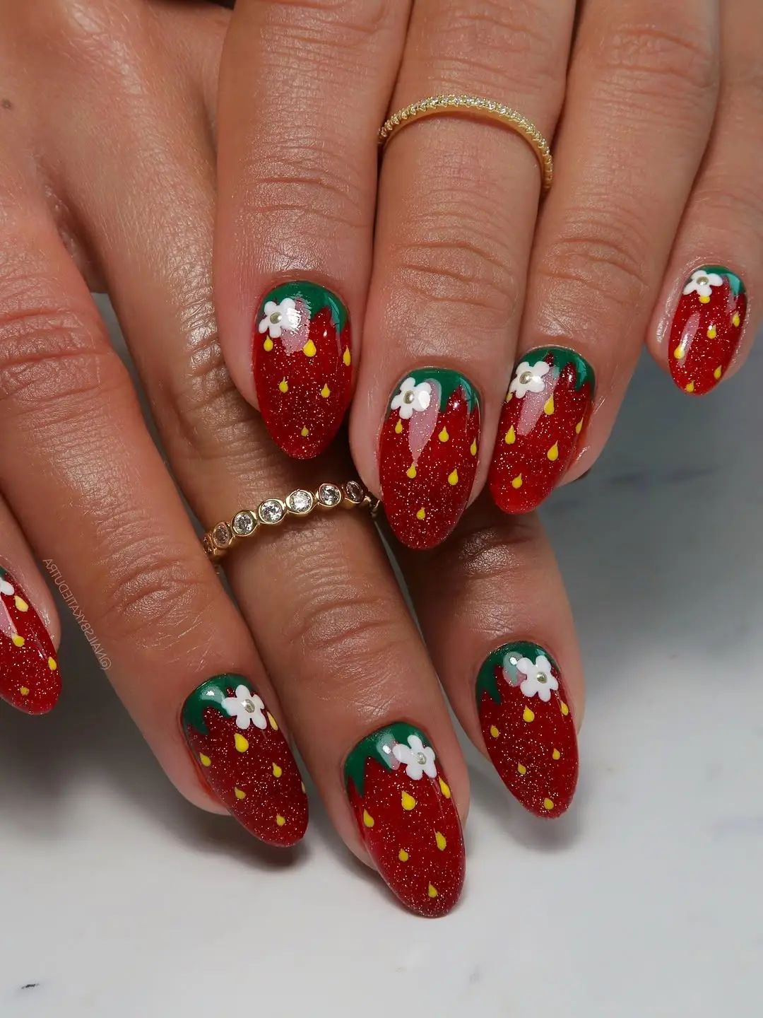 Vibrant Strawberry Nails with Floral Accents