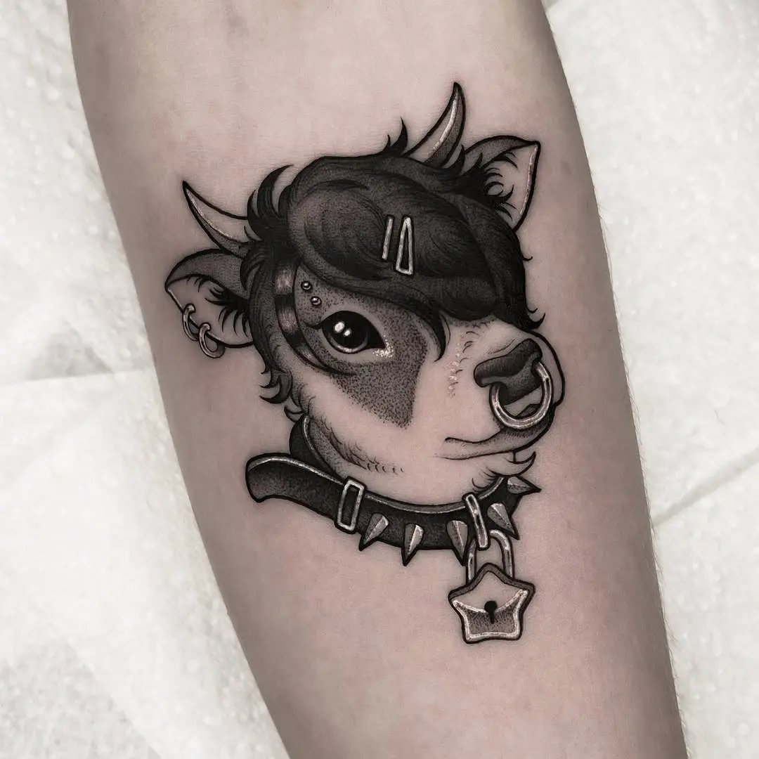 Charming cow tattoo with playful attitude