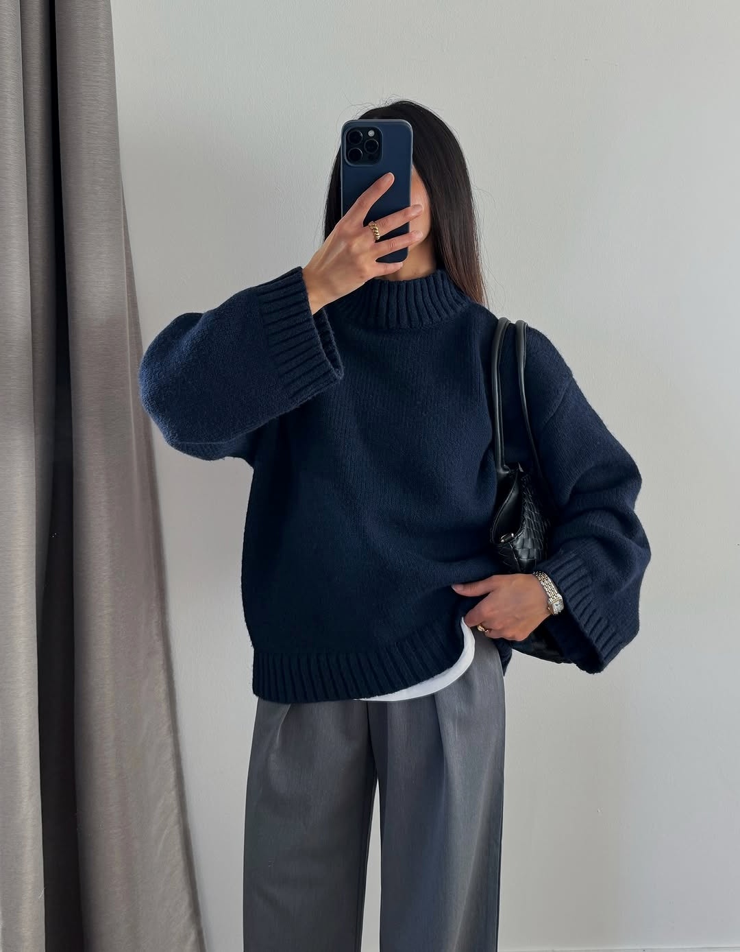 Chic navy sweater paired with wide-leg trousers