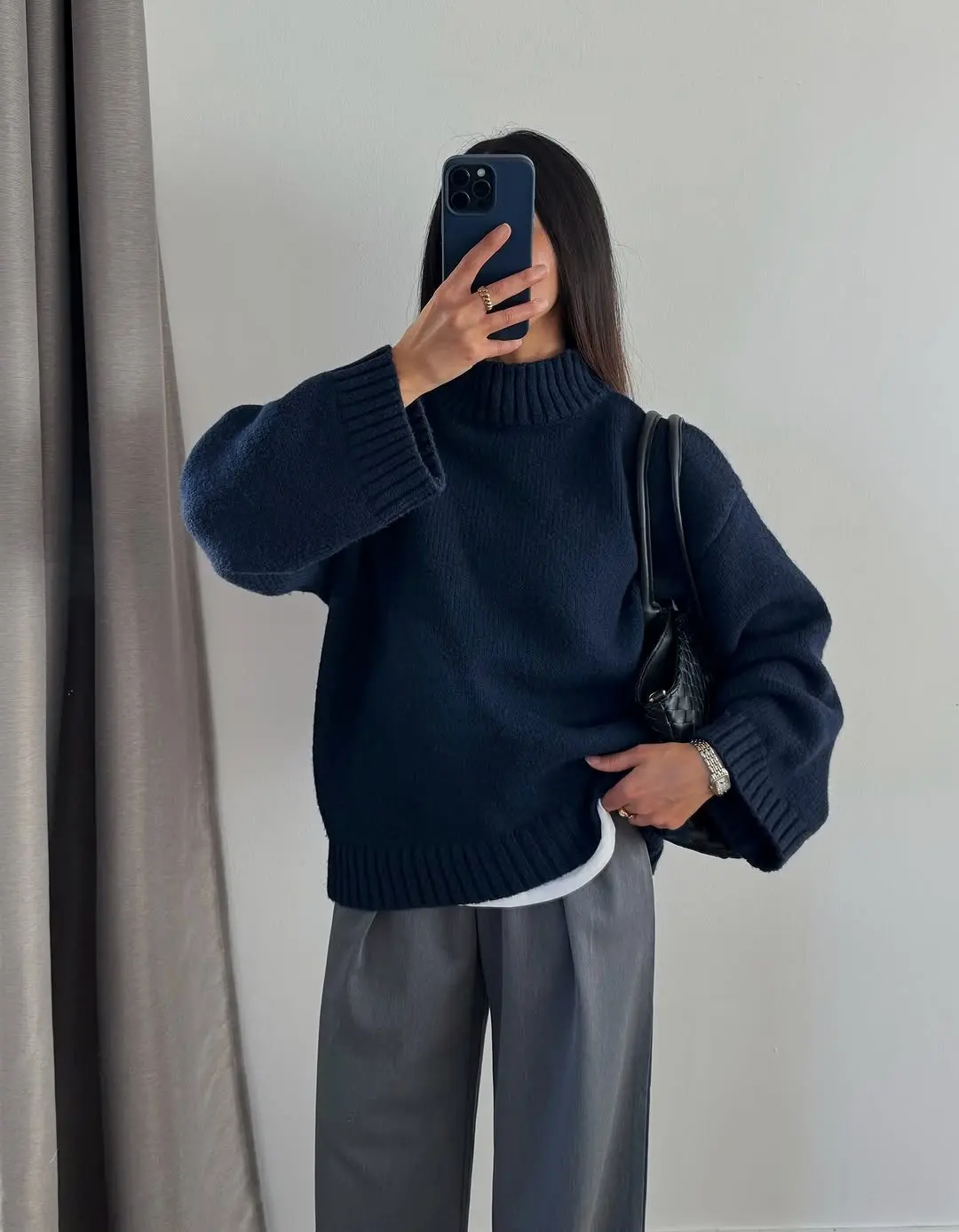 Chic navy sweater paired with wide-leg trousers