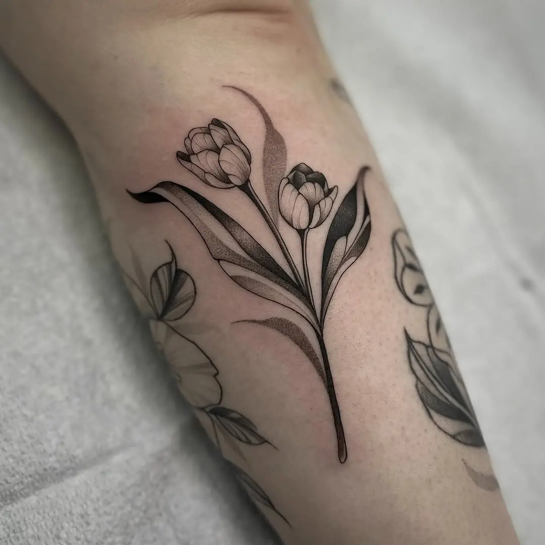 Elegant tulip tattoo showcasing natural beauty