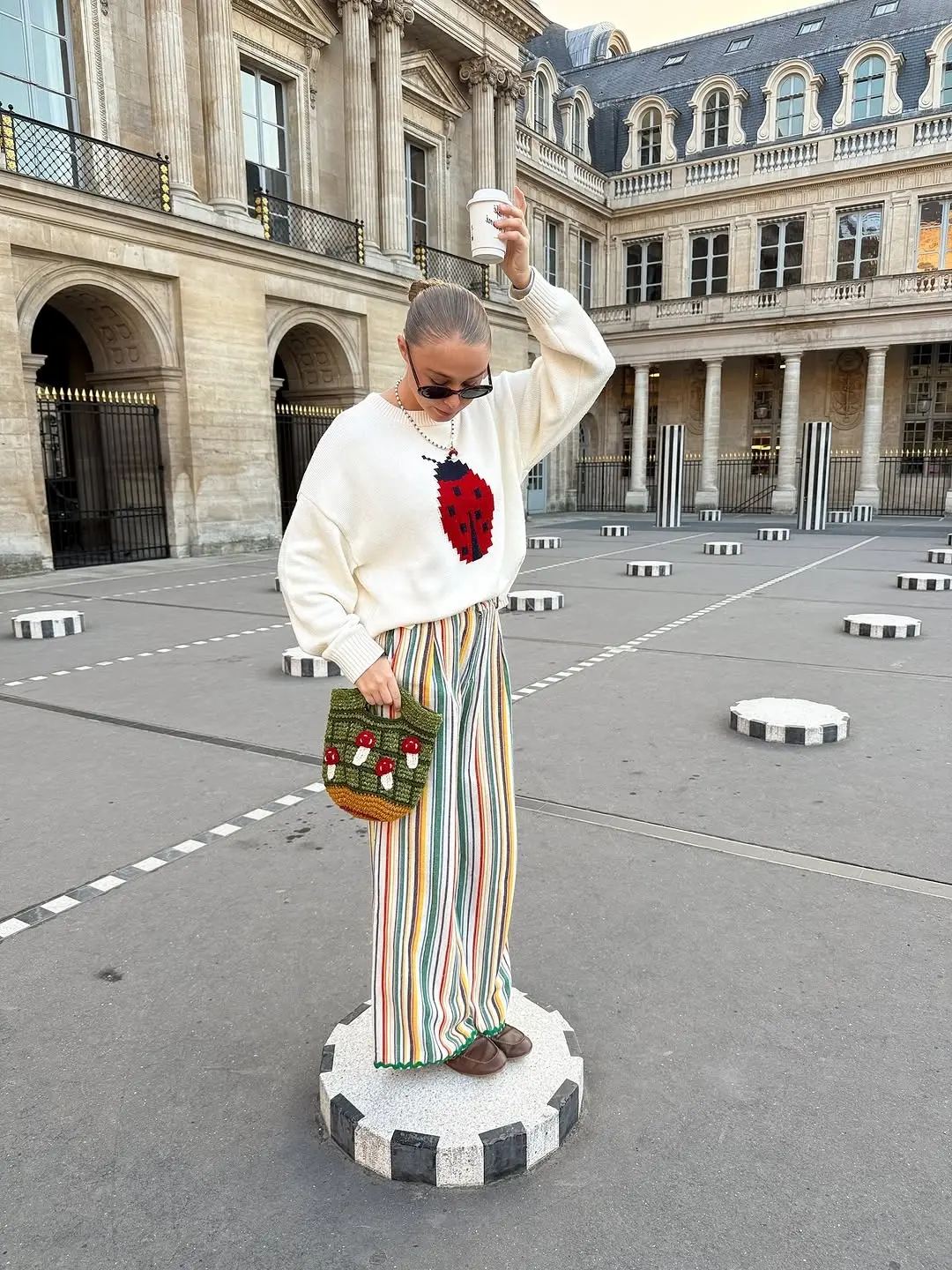 Chic Sweater with Colorful Striped Pants