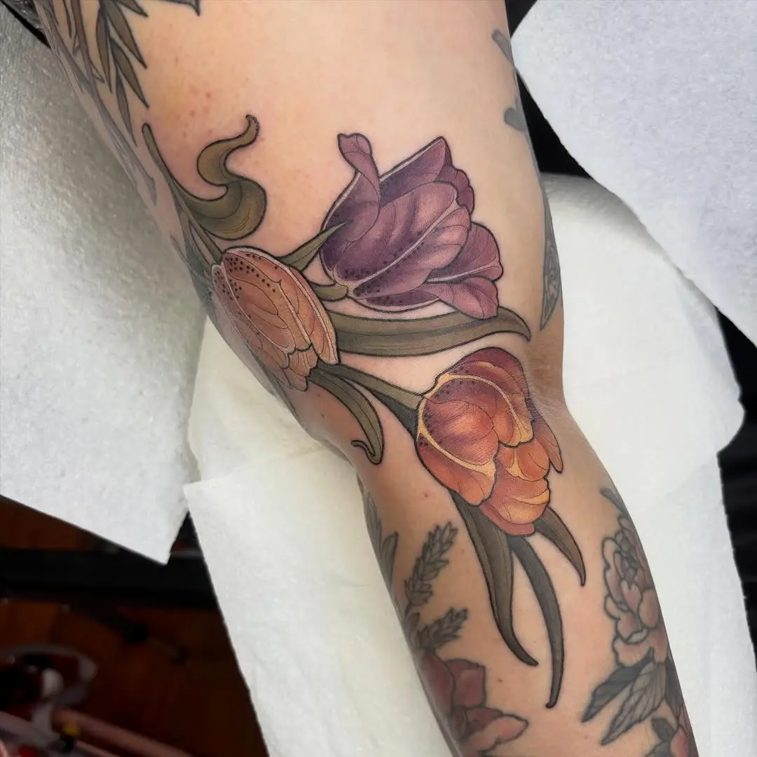 Vibrant tulip tattoos for floral enthusiasts