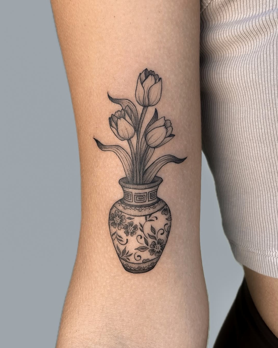 Elegant Tulip Tattoo in Decorative Vase