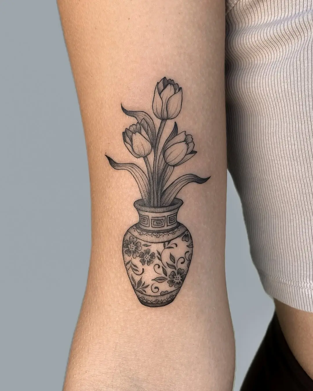 Elegant Tulip Tattoo in Decorative Vase