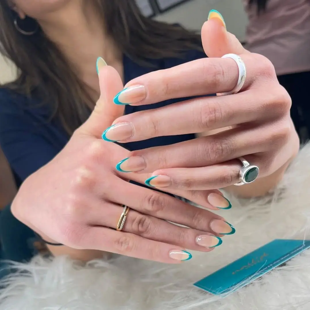 Chic turquoise French tip nail design