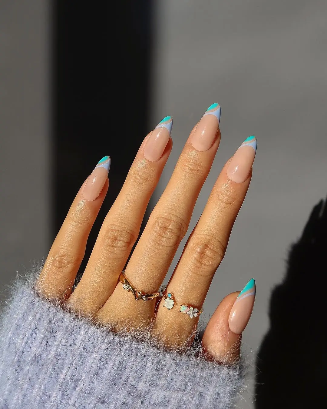 Chic turquoise French tip nail design
