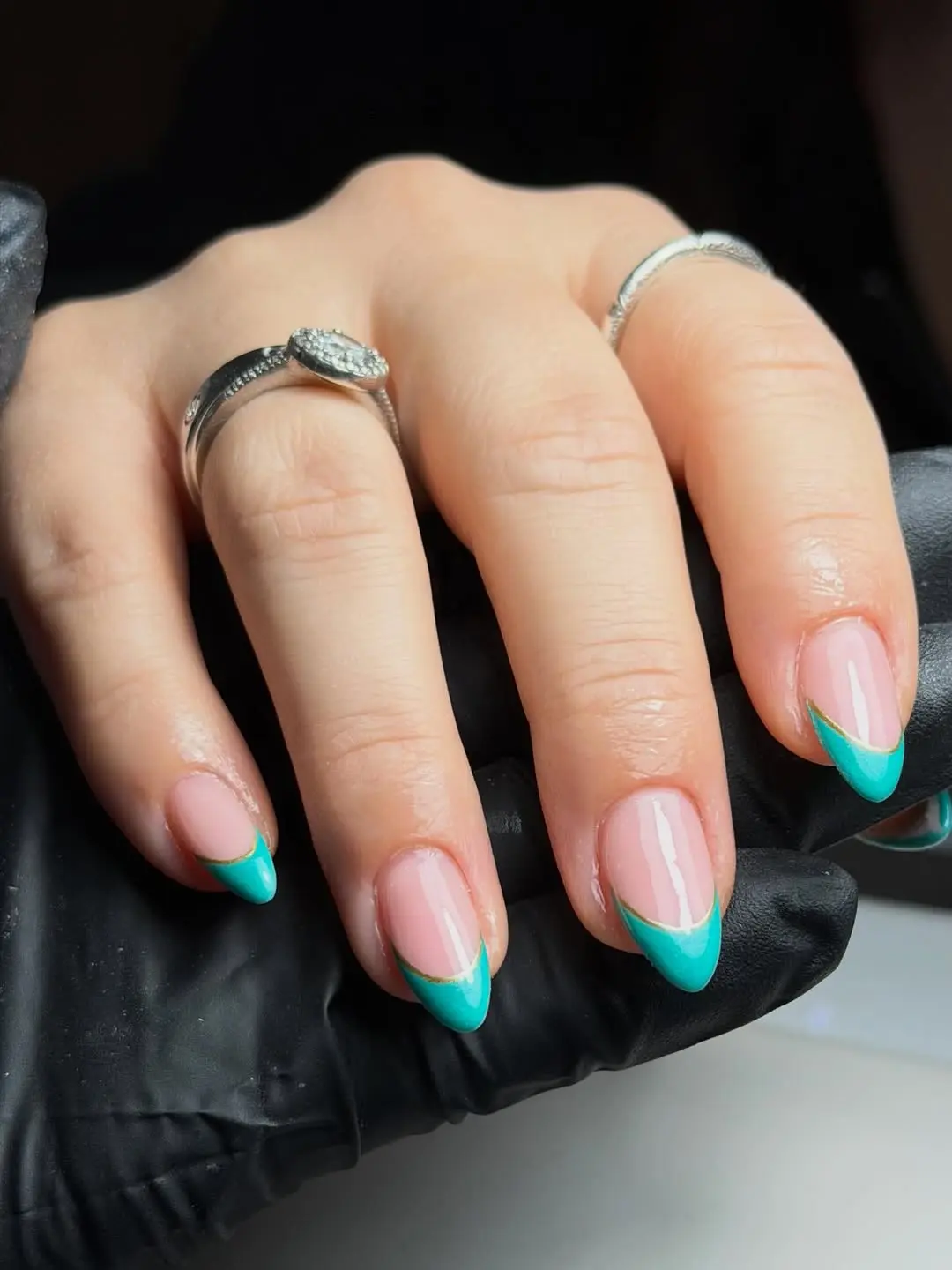 Stylish turquoise French tips with a chic twist