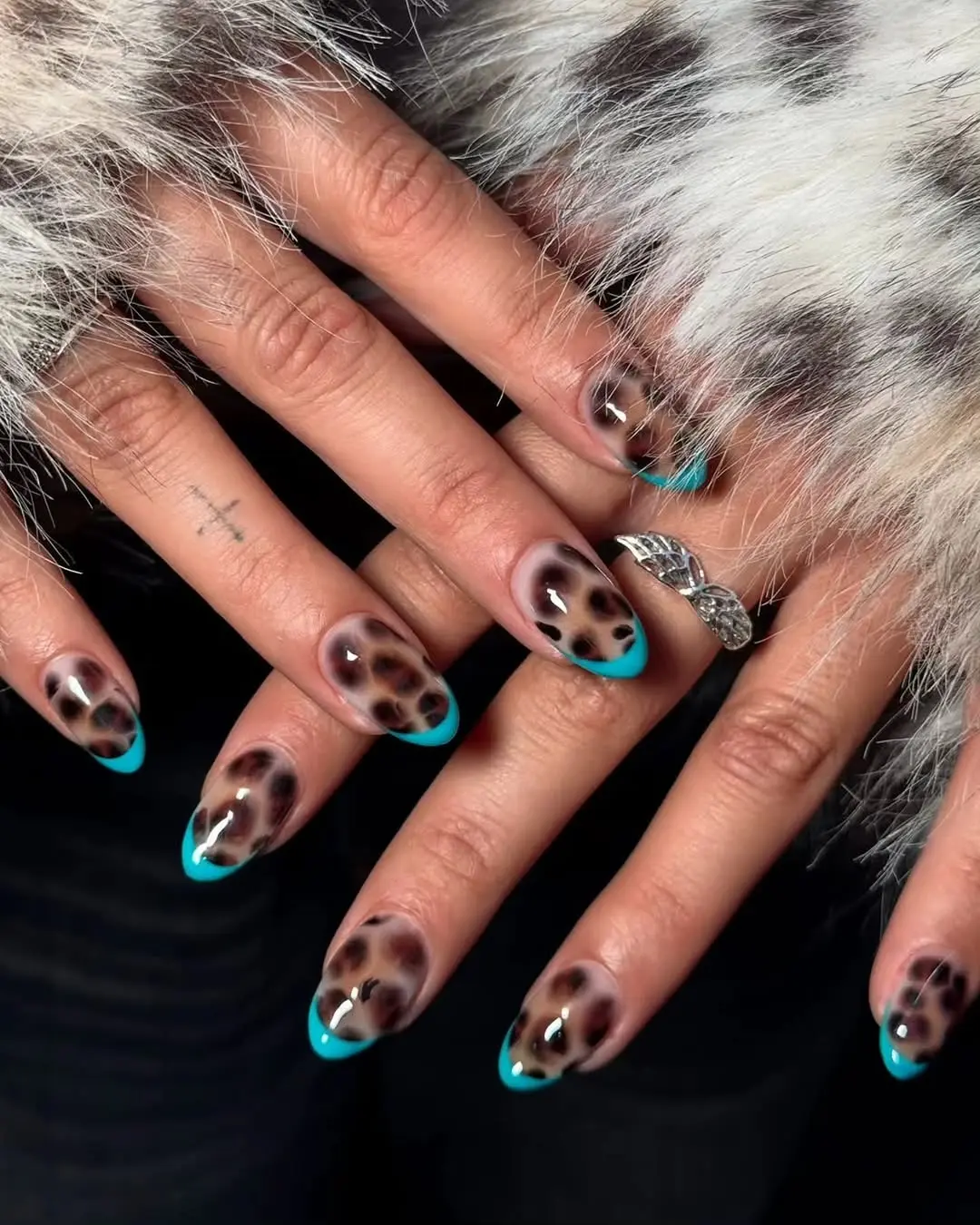Chic turquoise French tips with a leopard twist