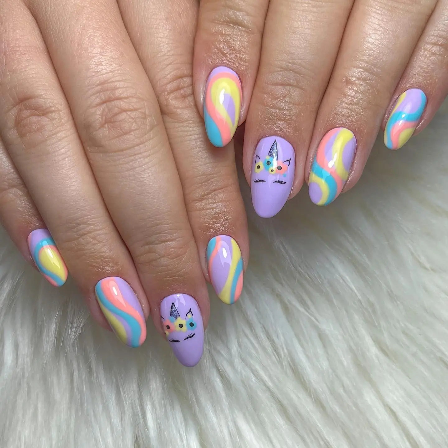 Playful unicorn-inspired nail art design