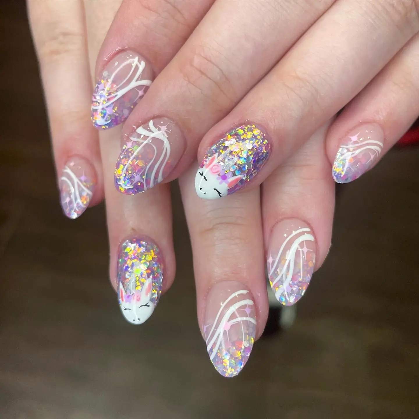 Sparkling unicorn nails with whimsical charm