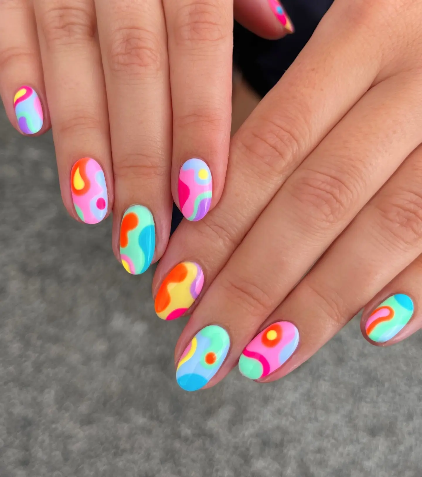 Bright and fun rainbow-inspired nail art design