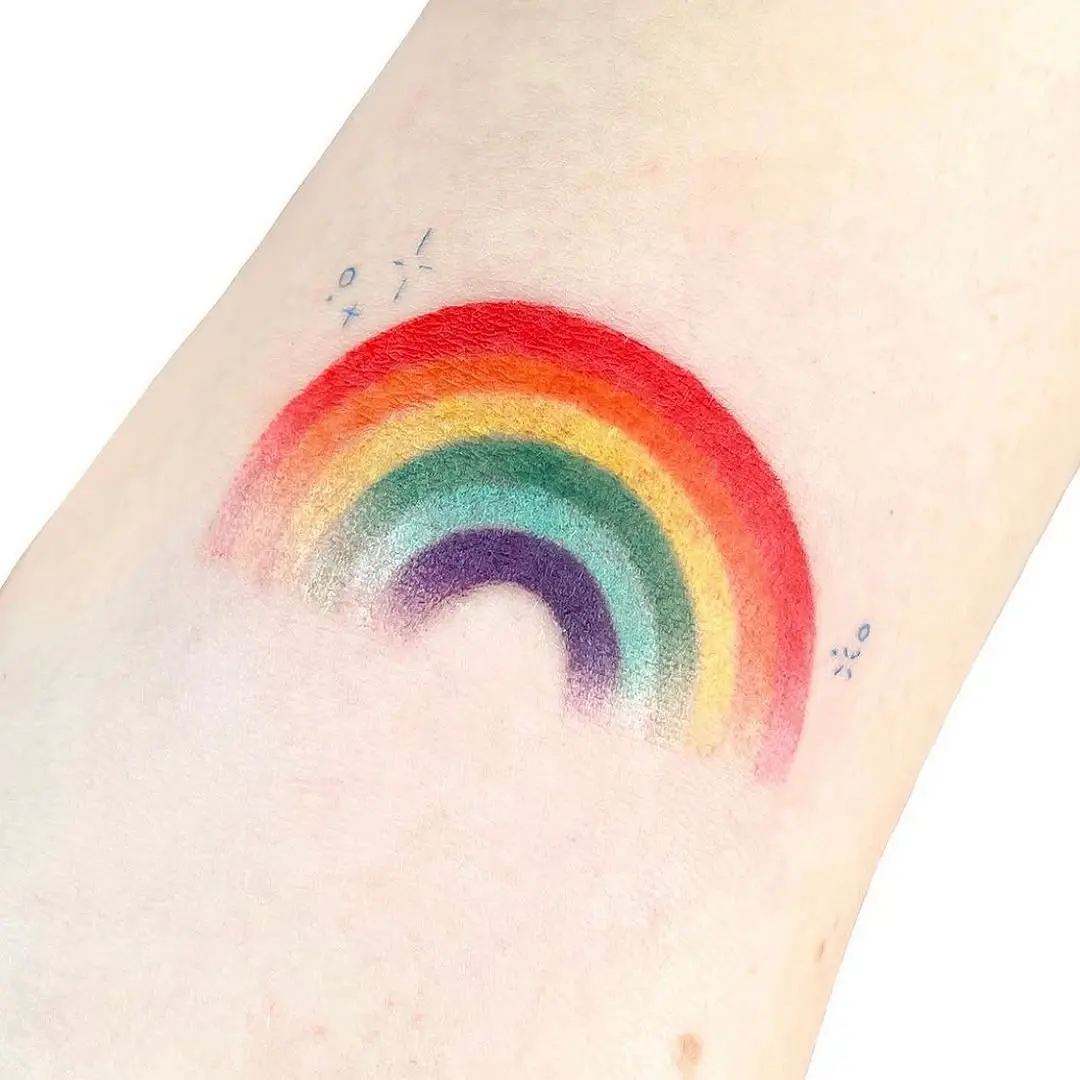 Cheerful rainbow tattoo celebrating pride.