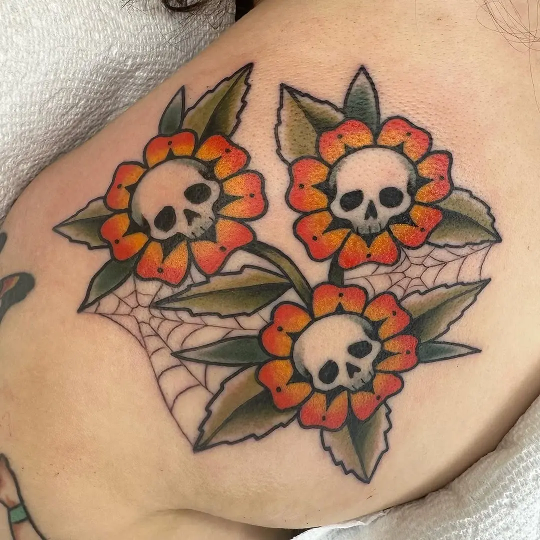 Colorful skulls intertwined with blooming flowers