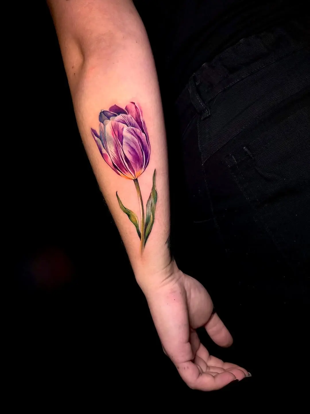 Beautiful tulip tattoo showcasing vibrant colors