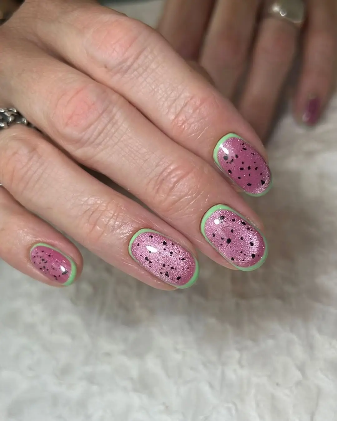 Vibrant pink and green watermelon-inspired nails
