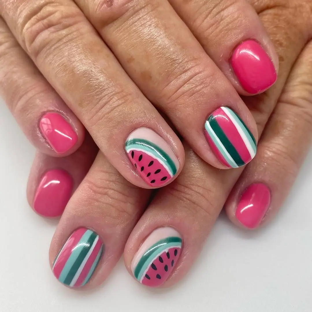 Vibrant watermelon-themed nails for summer fun