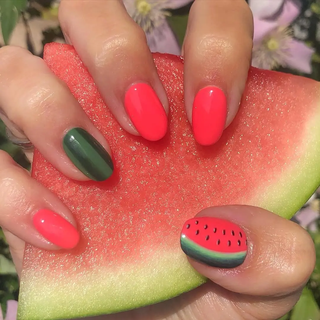 Bright watermelon nails for a fun summer look
