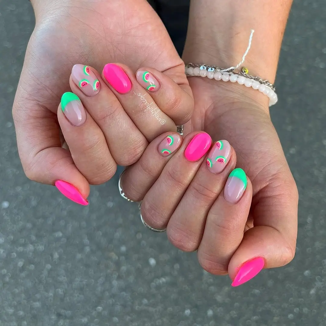 Vibrant watermelon-themed nail art design